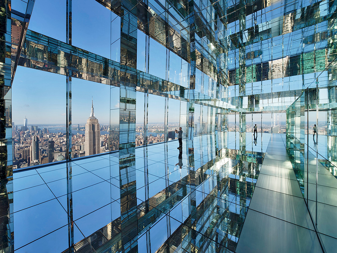 shimmering panes of glass displayed artistically at Summit One Vanderbilt in NYC, showing an incredible architectural design