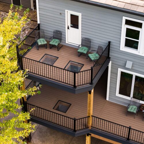 aerial shot of glass deck panels in outdoor wood patio
