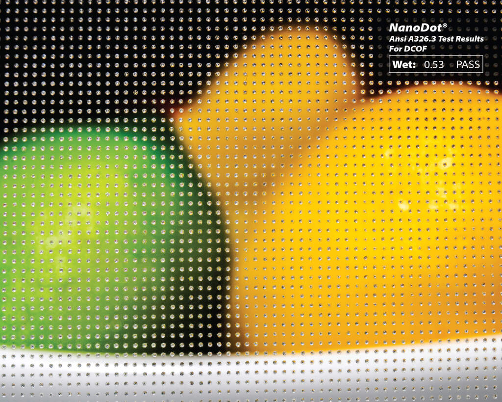 A close-up vision of a fruit bowl behind the Nano Dot Anti-Slip glass.